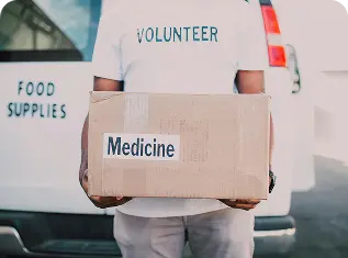 Volunteers delivering medicine