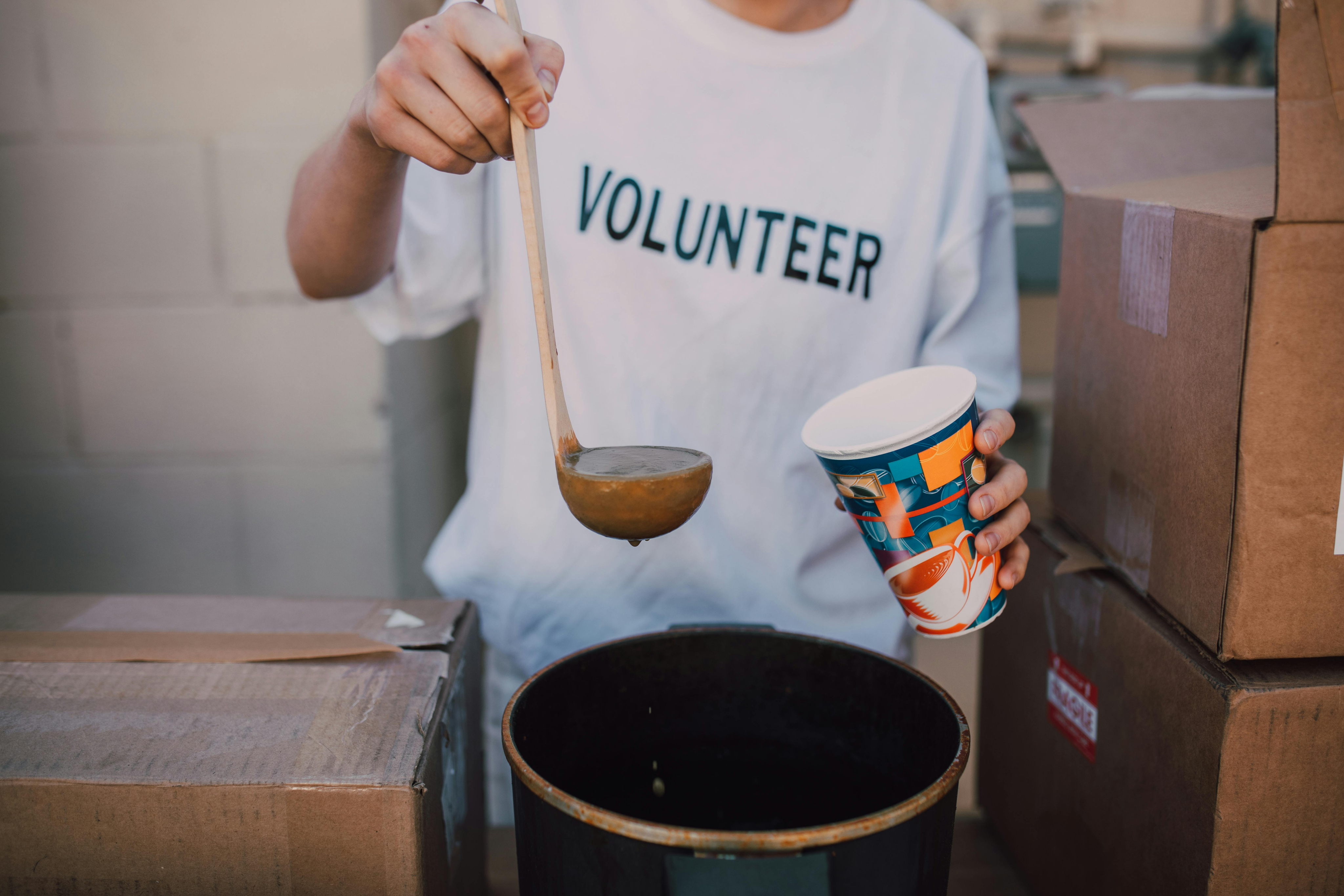 Soup distribution at community kitchen